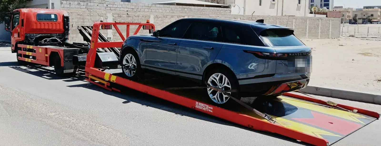 رنج روفر فيلار مثبتة على سطحة مسطحة تابعة لسطحة إكسبريس