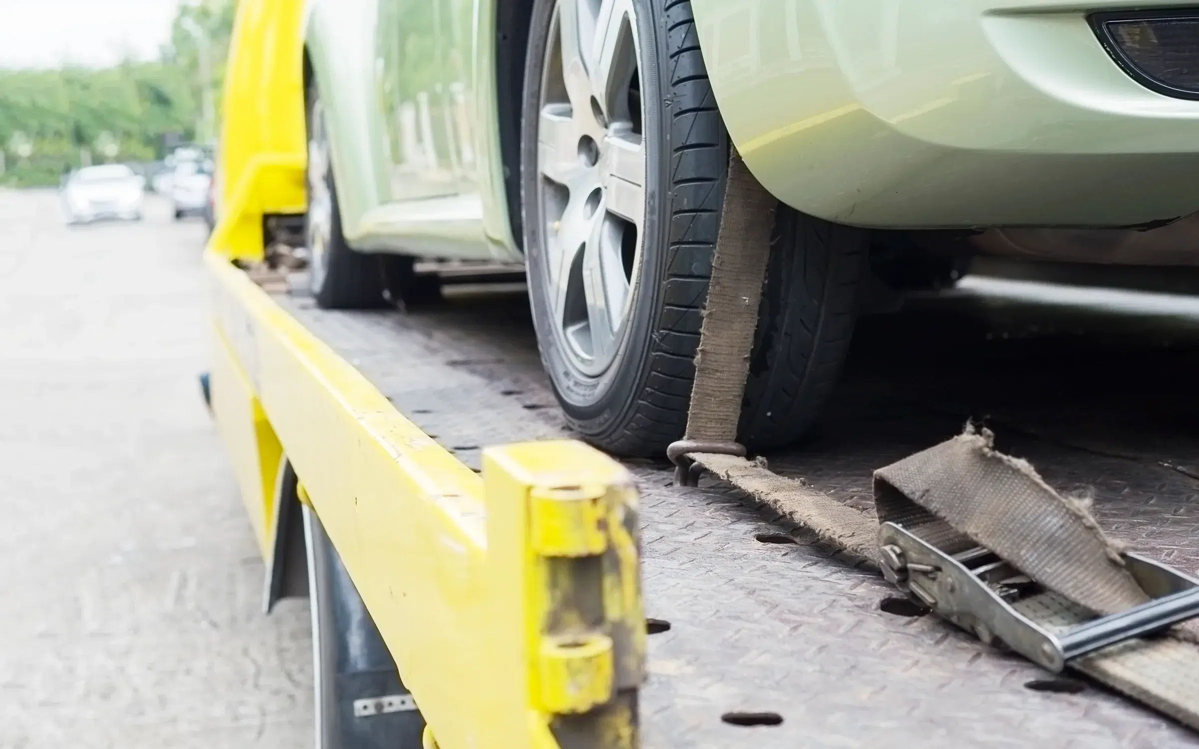 Recovery vehicle extracting a stranded car in Saudi Arabia